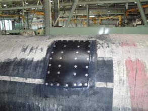 Rubber mat bonded over the damaged area with Belzona 2211 (MP Hi-Build Elastomer)